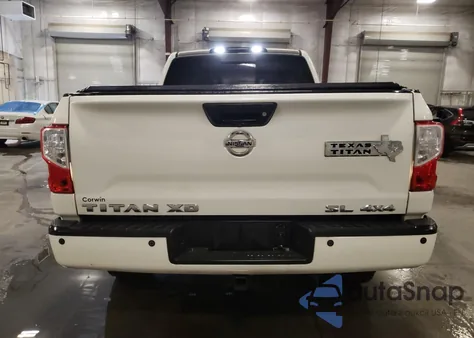 2018 Nissan Titan Xd Sl from USA, damaged, VIN 1N6AA1F49JN522371